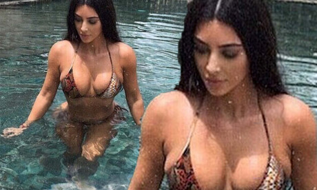 Kim Kardashian Flashes Her Bombshell Bikini Body In Sizzling Snap Of Her Climbing Out Of The Pool Daily Mail Online